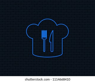 Neon light. Chef hat sign icon. Cooking symbol. Cooks hat with fork and knife. Glowing graphic design. Brick wall. Vector
