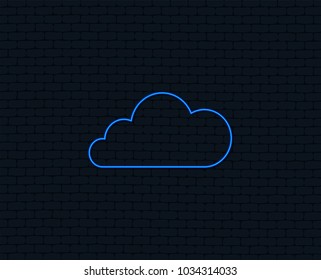 Neon light. Cloud sign icon. Data storage symbol. Glowing graphic design. Brick wall. Vector