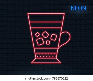 Neon light. Frappe coffee icon. Cold drink sign. Beverage symbol. Glowing graphic design. Brick wall. Vector