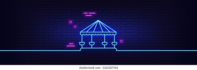 Neon light glow effect. Carousels line icon. Amusement park sign. 3d line neon glow icon. Brick wall banner. Carousels outline. Vector