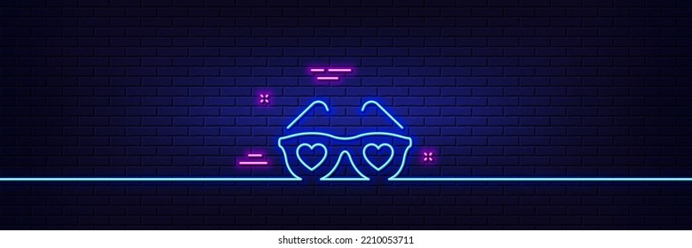 Neon light glow effect. Glasses with hearts line icon. Valentines day spectacles sign. Love accessory symbol. 3d line neon glow icon. Brick wall banner. Love glasses outline. Vector