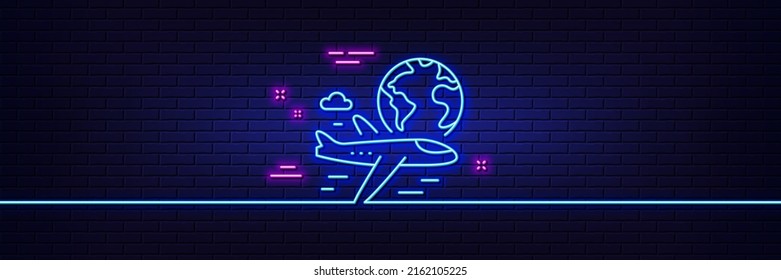 Neon light glow effect. Global travel line icon. International flight sign. Online trip symbol. 3d line neon glow icon. Brick wall banner. International flight outline. Vector