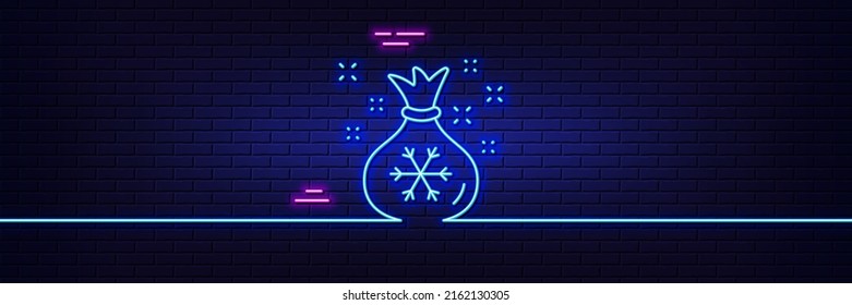 Neon light glow effect. Santa sack line icon. Christmas or New year sign. Bag with gifts and presents symbol. 3d line neon glow icon. Brick wall banner. Santa sack outline. Vector