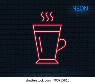 Neon light. Latte line icon. Hot Coffee or Tea sign. Fresh beverage symbol. Glowing graphic design. Brick wall. Vector