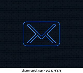 Neon light. Mail icon. Envelope symbol. Message sign. Mail navigation button. Glowing graphic design. Brick wall. Vector
