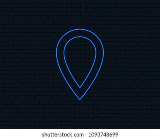 Neon light. Map pointer sign icon. Location marker symbol. Glowing graphic design. Brick wall. Vector