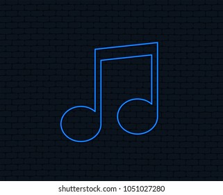 Neon light. Music note sign icon. Musical symbol. Glowing graphic design. Brick wall. Vector