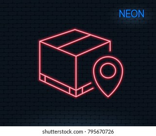 Neon light. Parcel tracking line icon. Delivery monitoring sign. Shipping box location symbol. Glowing graphic design. Brick wall. Vector