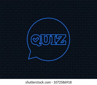 Neon light. Quiz check in speech bubble sign icon. Questions and answers game symbol. Glowing graphic design. Brick wall. Vector