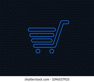 Neon light. Shopping Cart sign icon. Online buying button. Glowing graphic design. Brick wall. Vector