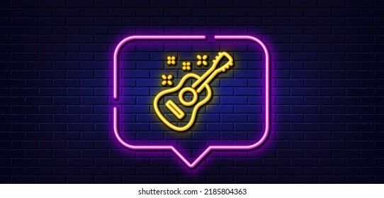 Neon light speech bubble. Acoustic guitar line icon. Music sign. Musical instrument symbol. Neon light background. Guitar glow line. Brick wall banner. Vector