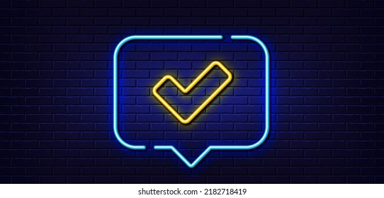 Neon light speech bubble. Check line icon. Approved Tick sign. Confirm, Done or Accept symbol. Neon light background. Tick glow line. Brick wall banner. Vector