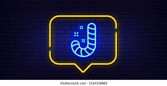 Neon light speech bubble. Christmas candy line icon. Cane lollypop sign. Neon light background. Candy glow line. Brick wall banner. Vector