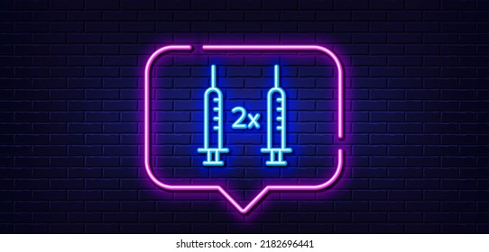 Neon light speech bubble. Coronavirus 2x vaccine line icon. Corona syringe sign. Covid jab symbol. Neon light background. Coronavirus vaccine glow line. Brick wall banner. Vector