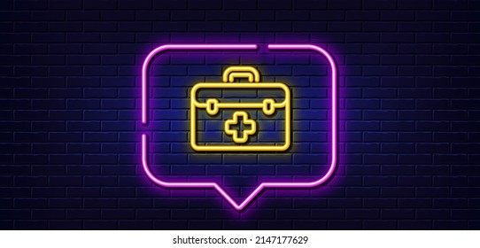 Neon light speech bubble. First aid line icon. Medicical kit sign. Pharmacy medication symbol. Neon light background. First aid glow line. Brick wall banner. Vector