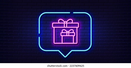 Neon light speech bubble. Gift boxes line icon. Present or Sale sign. Birthday Shopping symbol. Package in Gift Wrap. Neon light background. Delivery boxes glow line. Brick wall banner. Vector