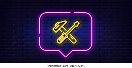 Neon light speech bubble. Hammer and screwdriver line icon. Repair service sign. Fix instruments symbol. Neon light background. Hammer tool glow line. Brick wall banner. Vector