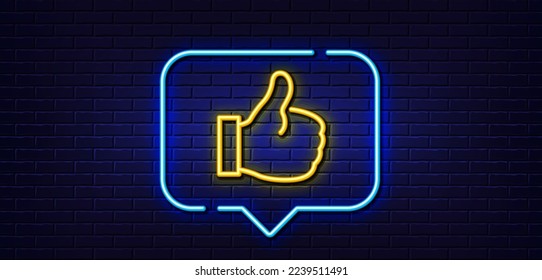 Neon light speech bubble. Like line icon. Thumbs up sign. Positive feedback, social media symbol. Neon light background. Like glow line. Brick wall banner. Vector