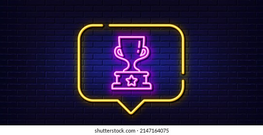 Neon light speech bubble. Winner cup line icon. Award trophy sign. Best achievement symbol. Neon light background. Winner cup glow line. Brick wall banner. Vector