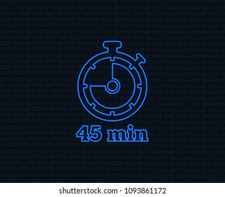 Neon light. Timer sign icon. 45 minutes stopwatch symbol. Glowing graphic design. Brick wall. Vector