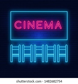 Neon lighting of the cinema. Bright advertising cinema hall. Modern vector logo, banner, shield, movie viewing pattern, chairs. Night advertising on the background of a brick wall.