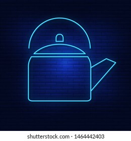 Neon lighting of the kettle. Bright is a hot kettle. Modern vector logo, icon, banner, shield, screen, teapot image. Night advertising on the background of a brick wall.