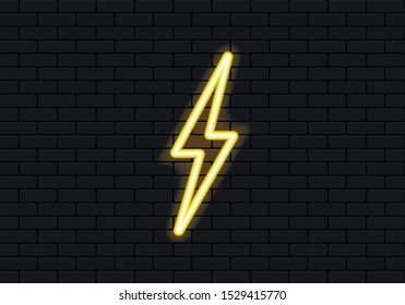 Neon lightning. Brightly red neon sign with night illumination on a black brick wall.