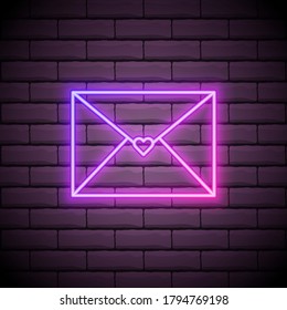 Neon love letter envelope sign. Bright light heart shape.
