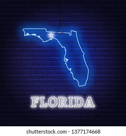 Neon map State of Florida on a brick wall background.