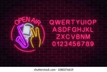 Neon open air sign with microphone, saxophone and piece gesture in round frame with alphabet. Live music jazz concert in open air icon. Glowing signboard of radio station. Vector illustration.
