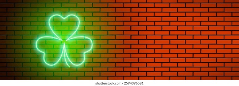 Neon Patrick's Day clover leaf or shamrock on the brick wall