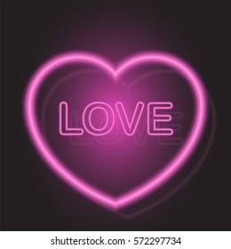 neon pink heart on Valentine day on black background.