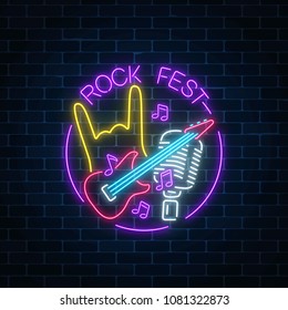 Neon rock festival sign with guitar, microphone and rock gesture in round frame. Live music in open air icon. Glowing signboard of radio station. Music show poster. Vector illustration.