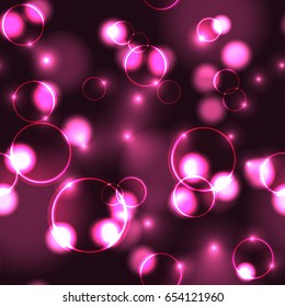 Neon rose bokeh effect seamless pattern. Dark background with Glowing sparkling circles and rings in pink colors. 