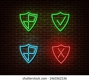 Neon safety shield signs vector isolated on brick wall. Neon security light symbol. Vector illustration.