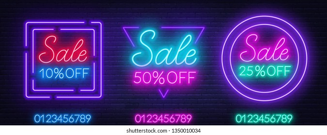 Neon sale signs on brick wall background.