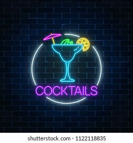 Neon sambuca cocktail sign in circle frame on dark brick wall background. Glowing gas advertising with glass of alcohol shake. Drinking canteen banner. Night club invitation. Vector illustration.