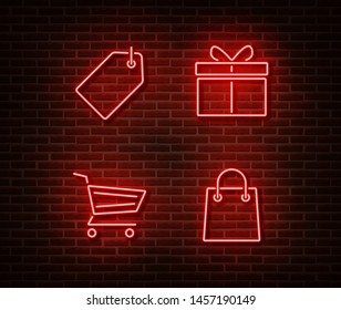 Neon shopping signs vector isolated on brick wall. Discount card,cart, gift, shop bag light symbol, decoration effect. Neon store illustration.