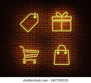 Neon shopping signs vector isolated on brick wall. Discount card,cart, gift, shop bag light symbol, decoration effect. Neon store illustration.