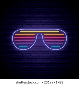 Neon shutter glasses sign in retro 80s style. Glowing sunglasses emblem on dark brick wall background. Vector illustration.