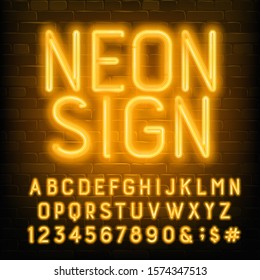 Neon Sign alphabet font. Yellow neon letters and numbers. Brick wall background. Stock vector typescript for your typography design.