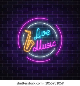 Neon sign of bar with live music. Advertising glowing signboard of sound cafe with saxophone symbol.