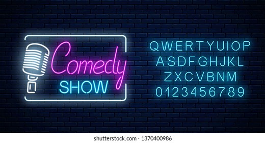 Neon sign of comedy show with retro microphone symbol with alphabet on a brick wall background. Humor monolog stand up glowing signboard. Vector illustration.