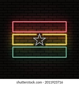 Neon sign in the form of the flag of Ghana. Against the background of a brick wall with a shadow. For the design of tourist or patriotic themes. The African continent