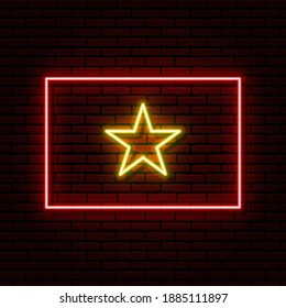 Neon sign in the form of the flag of Vietnam. Against the background of a brick wall with a shadow. for the design of tourist or patriotic themes. Red yellow colors.