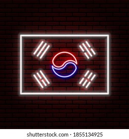 Neon sign in the form of the Korean flag. Against a brick wall with a shadow. For registration on tourist or Patriotic themes. White, red and blue colors.