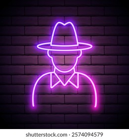 Neon sign of a man wearing a hat against a dark brick wall creates a vibrant atmosphere in an urban setting during the night