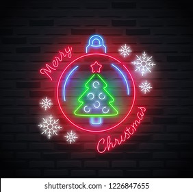 Neon sign of 'Merry Christmas' text, christmas ball, snowflakes and christmas tree inside the ball