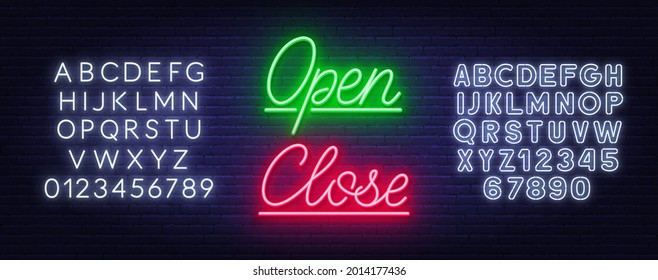 Neon sign open and close on brick wall background.