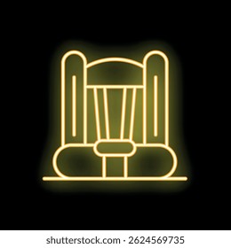 Neon sign representing a bouncy castle glowing yellow on a black background